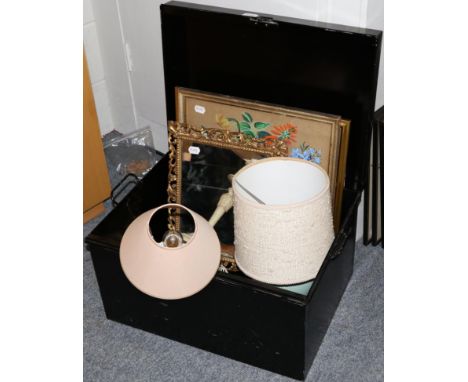 A metal trunk together with a telescope, a pair of binoculars, two table lamps, two needleworks and a gilt framed mirror 