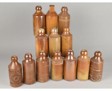 Twelve Vintage Stoneware Ginger Beer and Other Bottles to Comprise Steward &amp; Patterson - Norwich &amp; Swaffham, T. Chall