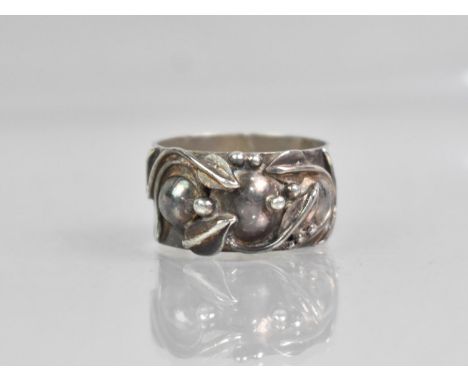 A Vintage Silver Ring, Berries, Apples and Leaves in Relief to Head, Wide Polished Flattened Band Hallmarked to the Interior 