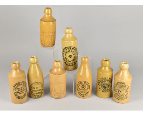 Eight Vintage Stoneware Ginger Beer Bottles to Comprise Drinkwater &amp; Newton - Over, H. Chas. Morris - Aberdare, John Dutt