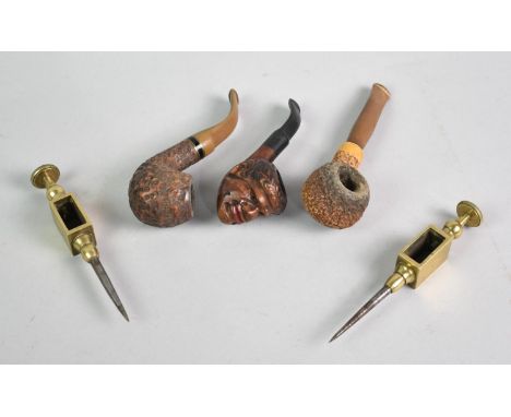 Three Various Vintage Pipes to Include had Carved Face Example together with Two Late 19th/Early 20th Century Brass Trammels