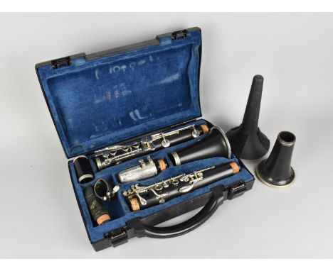 A Cased Buffet Crampon &amp; Co Paris Clarinet with Additional Pieces