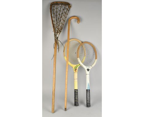 A Vintage Lacrosse Stick, Two Rackets and a Walking Stick