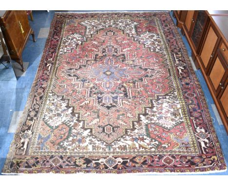 A Vintage Persian Heriz Type Carpet, 303x219cms