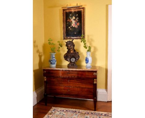 A Louis Philippe mahogany commode, circa 1840, the alabaster top above frieze drawer and two further long drawers flanked by 