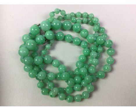 JADE NECKLACE AND OTHER JEWELLERY, also including a jade bracelet set in white gold, earrings and other itemsThe jade peices 