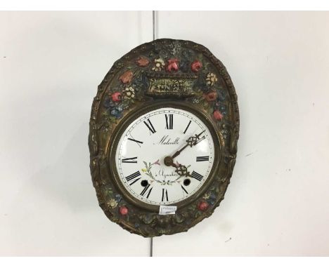 WALL CLOCK, with brass embossed floral decoration140cm long overall