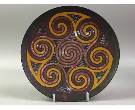 JOHN LEMAN COPPER AND ENAMEL PLATE, decorated with scrolls, signed to back17.5cm wide