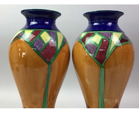 PAIR OF HAND PAINTED BALUSTER VASES, of Clarice Cliff design 30cm highBoth vases crazed. No obvious cracks or chips.more imag