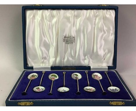 SET OF EIGHT SILVER AND ENAMEL COFFEE SPOONS, EARLY 20TH CENTURY  the oval bowl interiors decorated with flowers and with sea