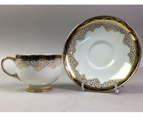 PARAGON TEA SERVICE, BLOSSOM PATTERN comprising twelve cups, eleven saucers, twelve side plates, cake plate, sugar bowl and m