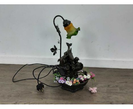 ART NOUVEAU STYLE BRONZED LAMP, decorated with cherubs and dolphins, with a green and orange shade48cm high