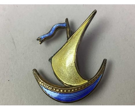 GROUP OF THREE SCANDANAVIAN SILVER AND ENAMEL BROOCHES, one in the form of a featherQty: 3