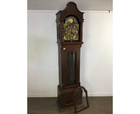 EDWARDIAN OAK CHIMING LONGCASE CLOCK, the three train movement striking on five gongs, the gilt brass dial set with silvered 