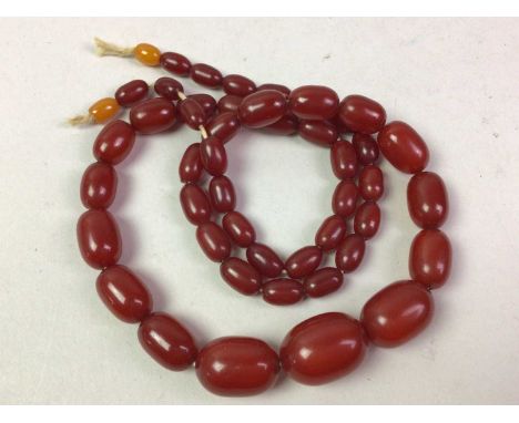 BAKELITE NECKLACE, AND ANOTHER each formed with rounded oval beadsbakelite necklace 77cm long Qty: 2Additional photographs of