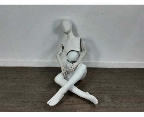 CHILD'S SIZED MANNEQUIN, in white composition and wood with moveable joints102cm high