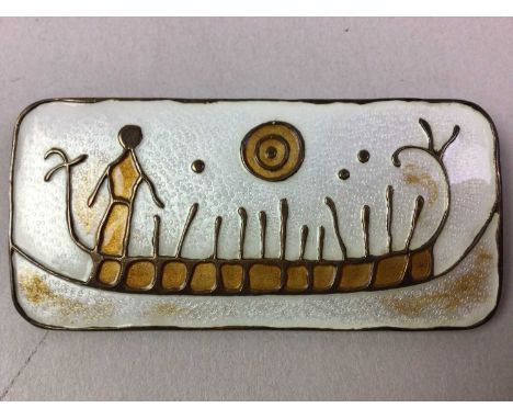 DAVID ANDERSON, NORWEGIAN ENAMEL 'ROCK CARVING' BROOCH of curved rectangular outline, depicting a rock carving in orange enam