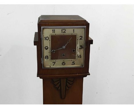 ART DECO WALNUT GRANDMOTHER CLOCK, the sqaure face with Roman numerals143cm highNo cracks present to face, at the time of thi