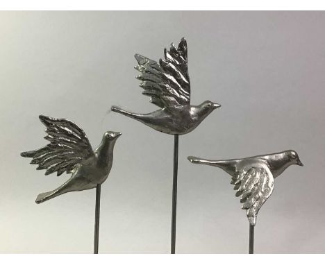 CONTEMPORARY SCULPTURE OF THREE BIRDS, ALONG WITH A METAL WALL ART the bird sculpture on ebonised base, the wall art modelled