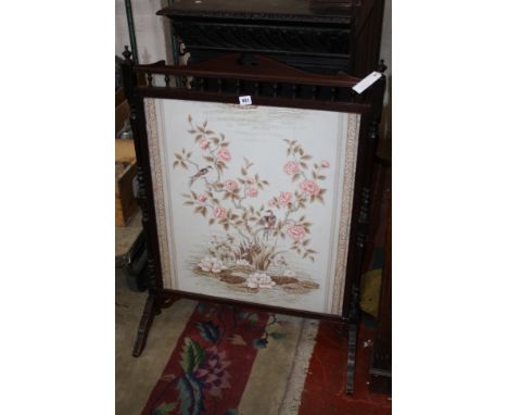An Edwardian mahogany firescreen together with a gilt Victorian style example with tapestry panel 