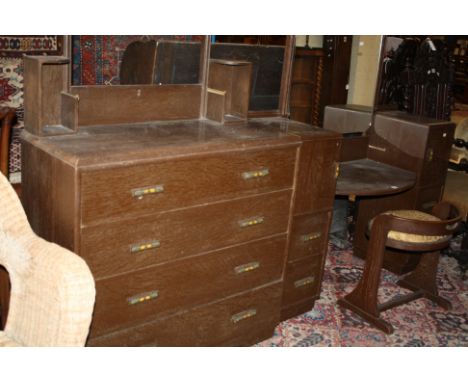 An Art Deco oak dressing table, chest and stool 130cm wide 