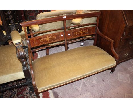 An Edwardian mahogany and inlaid two seater sofa