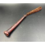 A vintage woven leather fisherman's priest