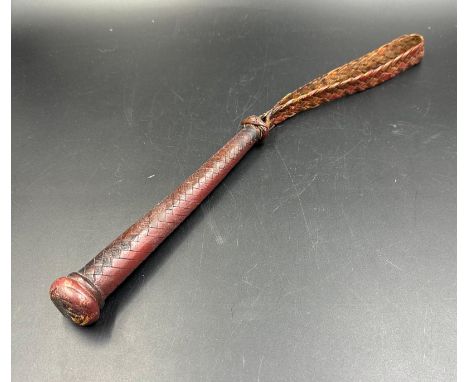 A vintage woven leather fisherman's priest