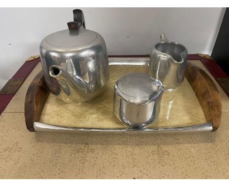 A Vintage Newmaid three piece tea service with tray to include teapot, sugar bowl and milk jug.
