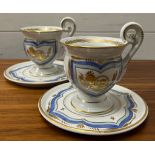 Two French cups and saucers