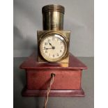 An Edwardian Ceiling projector clock or brothel clock, the circular dial with Roman numerals in a