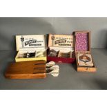 Three boxes of vintage darts and a cribbage set