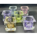 Six glass candle holders