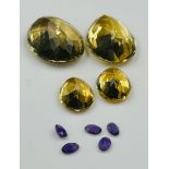 A selection of semi precious stones to include amethyst, citrine etc