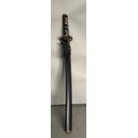 A Wakazachi black wood Japanese sword