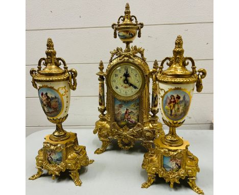 An Italian style garniture mantle clock