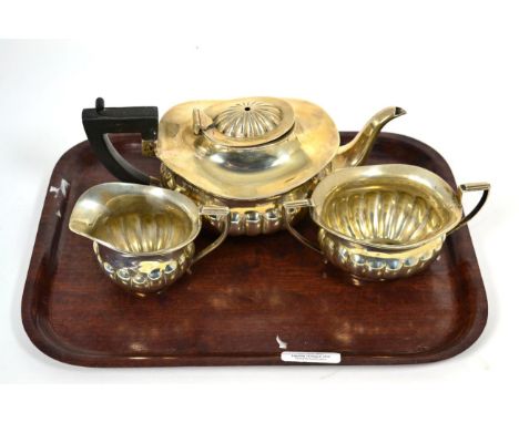 A three piece silver tea service