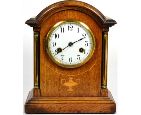 An oak striking table clock, movement stamped Junghans 