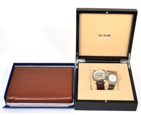 A Tissot quartz wristwatch; a Pal Zileri chronograph wristwatch; and a Rapport London double watch brown leather travel case 