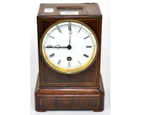 A rosewood mantel timepiece 