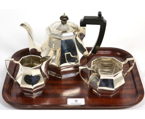 A three piece silver tea service, Jones & Crompton Birmingham 1927, of octagonal baluster form, 23ozt 