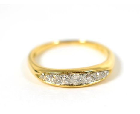 A diamond ring, seven graduated old cut diamonds to a lozenge-shaped shank, total estimated diamond weight 0.30 carat approxi