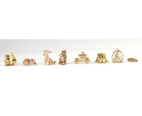 Eight various 9 carat gold charms, including; a poodle, a cat, a classic car, an elephant, a tractor, wedding bells, a canary