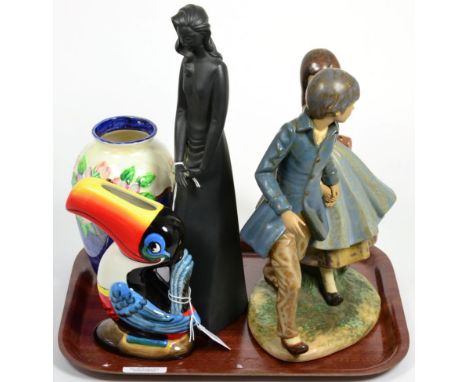 A Lladro figural group, young boy and girl holding hands, pastel palette; together with a Royal Doulton 'Contemplation' figur