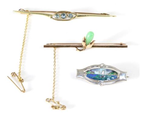 A silver Charles Horner brooch, a central oval plaque depicting a yacht on water, measures 1.5cm by 3cm; an aquamarine brooch