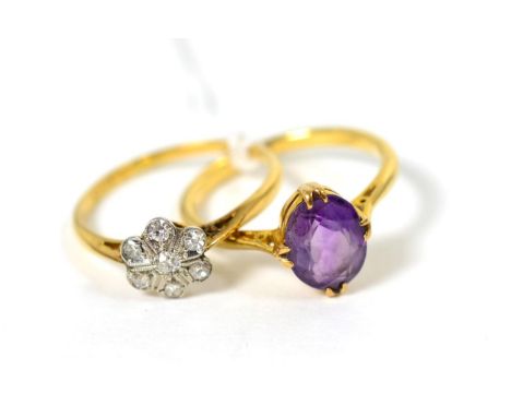 An early twentieth century diamond cluster ring, total estimated diamond weight 0.20 carat approximately, finger size O, stam