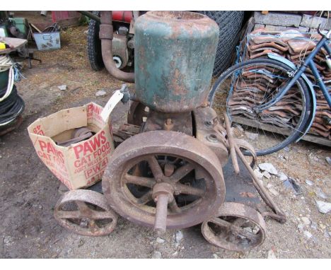 A Lister stationary engine A type, number 255939, 3hp 600rpm raised on a trolly