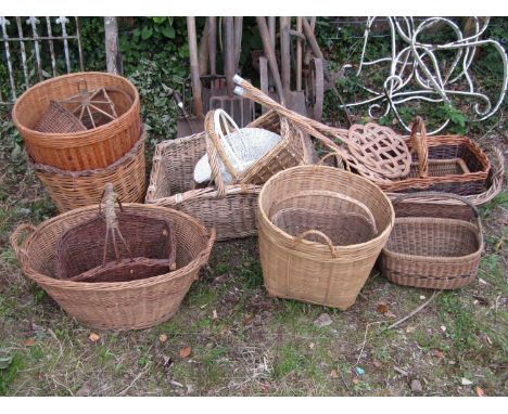 A quantity of various wicker baskets, two carpet beaters, etc 