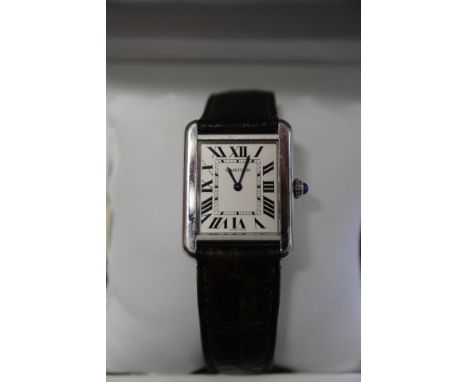 A gentleman's Cartier stainless steel cased Tank wristwatch with quartz movement, silvered dial and Roman numerals, on leathe