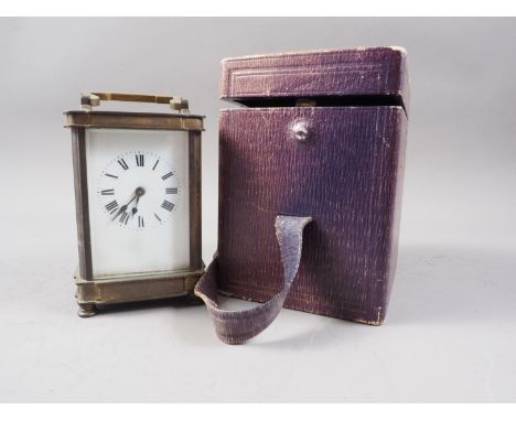 A brass cased carriage clock, 5" high, and a carriage clock case 